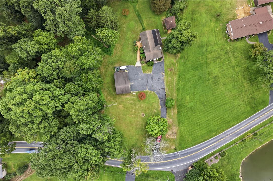 3573 Lower Saucon Road Hellertown, PA 18055 - Photo 56 of 56 Mature trees surround this private property bordered by a paved winding road.