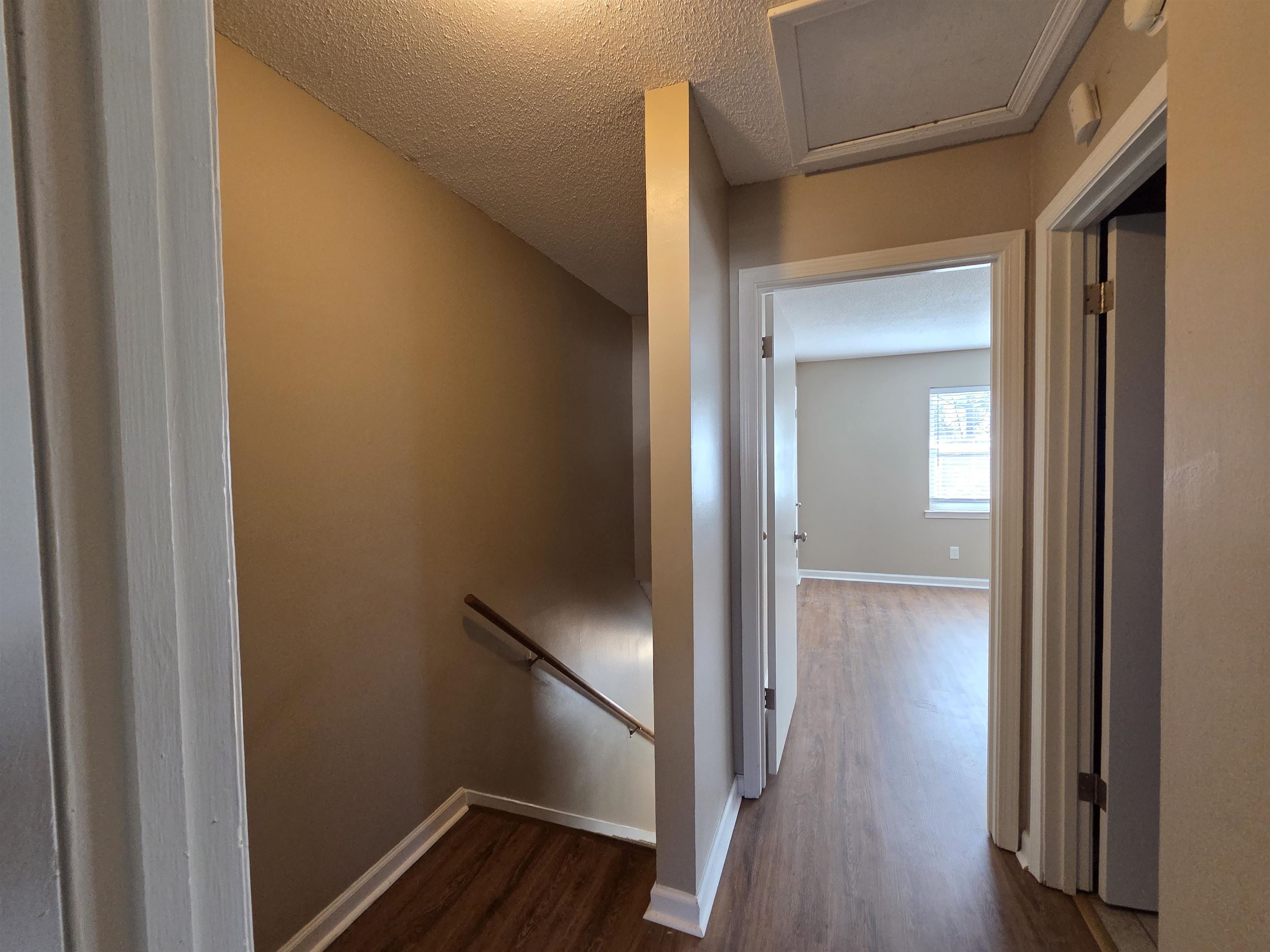 2104 Harbert Avenue Memphis, TN 38104 - Photo 12 of 26 a view of a hallway with wooden floor