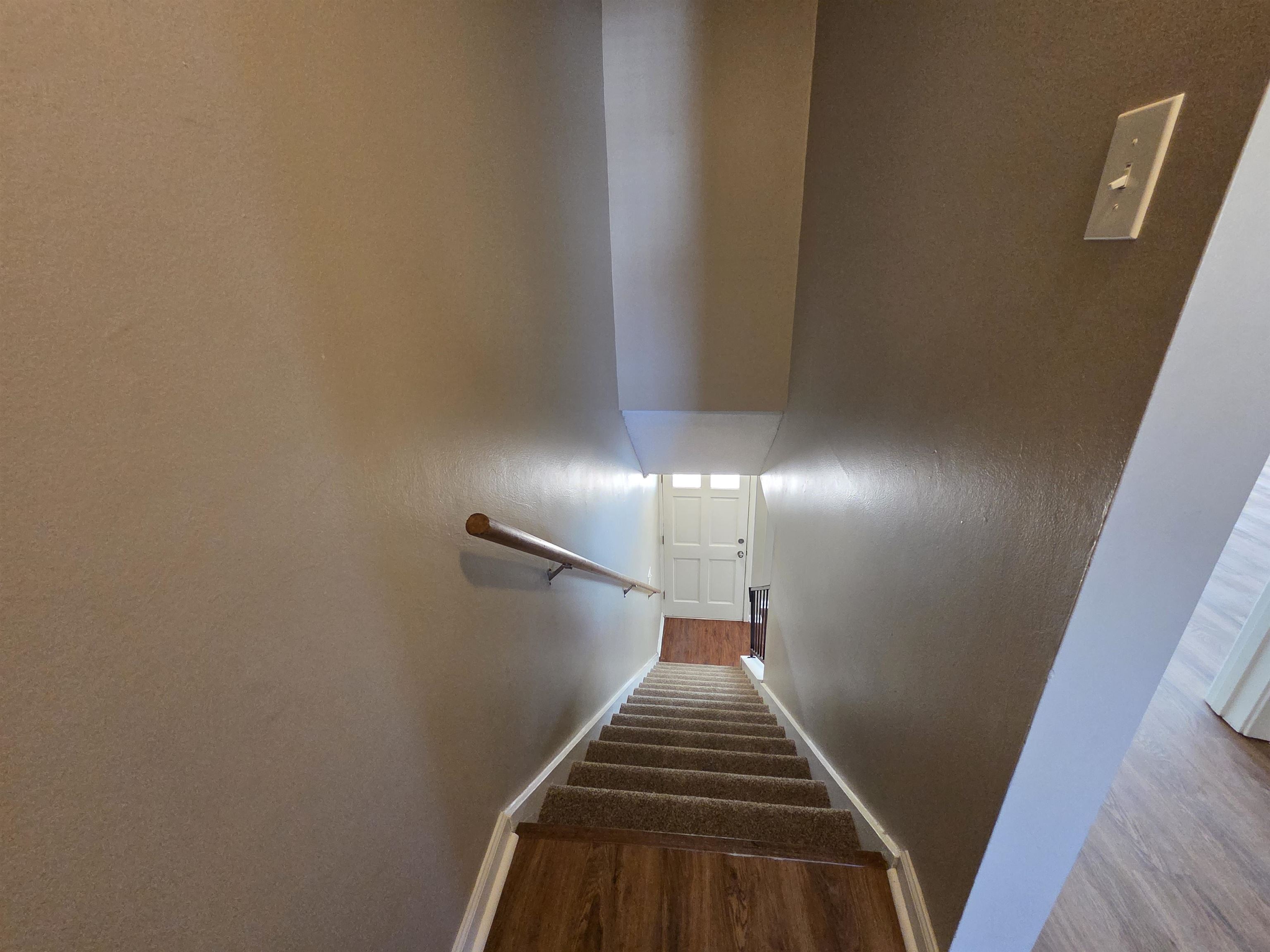 2104 Harbert Avenue Memphis, TN 38104 - Photo 13 of 26 Stairs with wood finished floors and baseboards