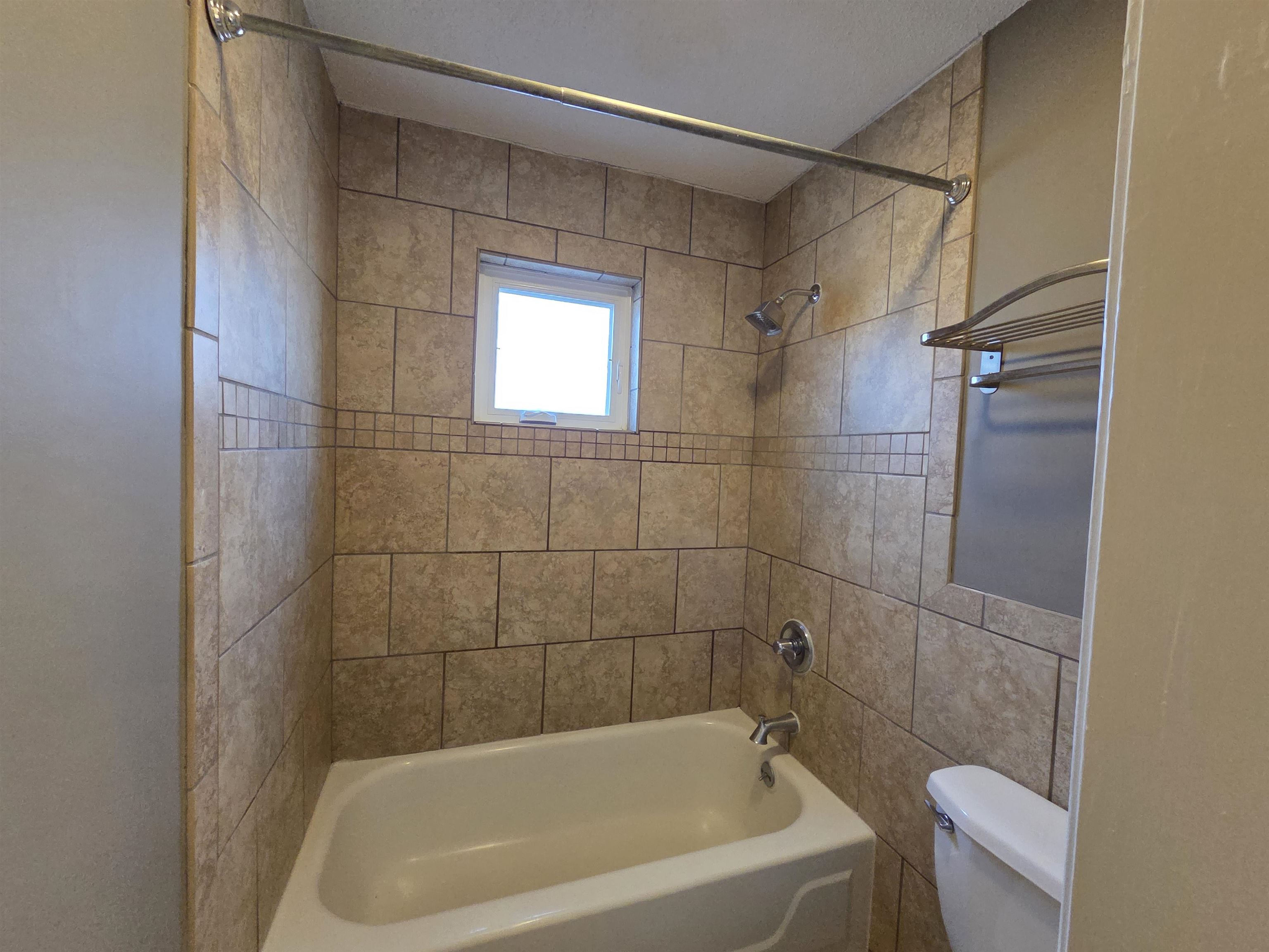 2104 Harbert Avenue Memphis, TN 38104 - Photo 20 of 26 Full bath with tub / shower combination and toilet