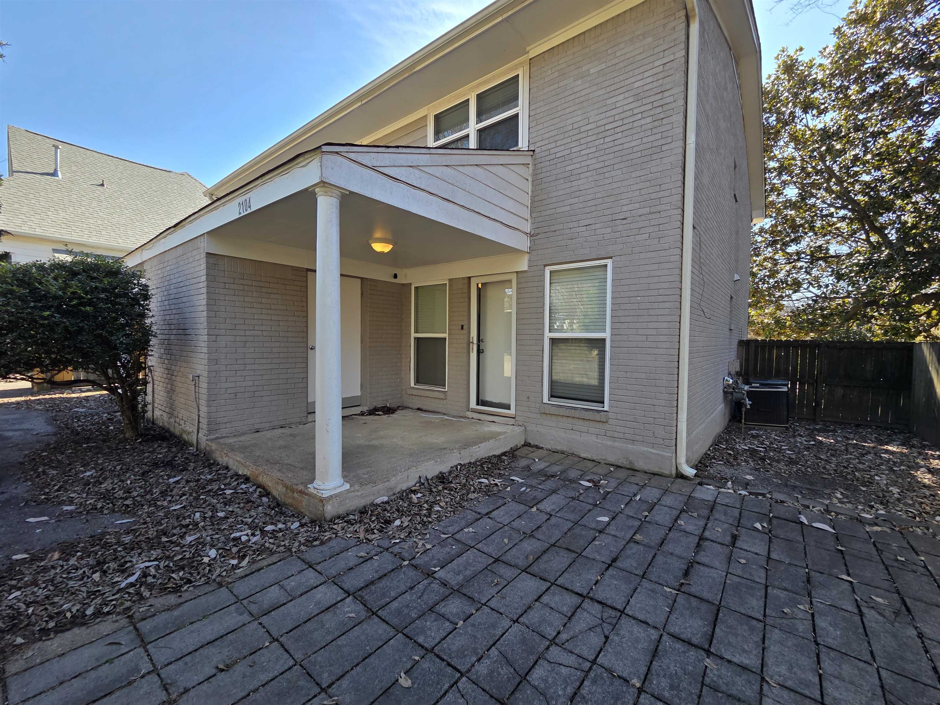 2104 Harbert Avenue Memphis, TN 38104 - Photo 24 of 26 a view of a house with a yard