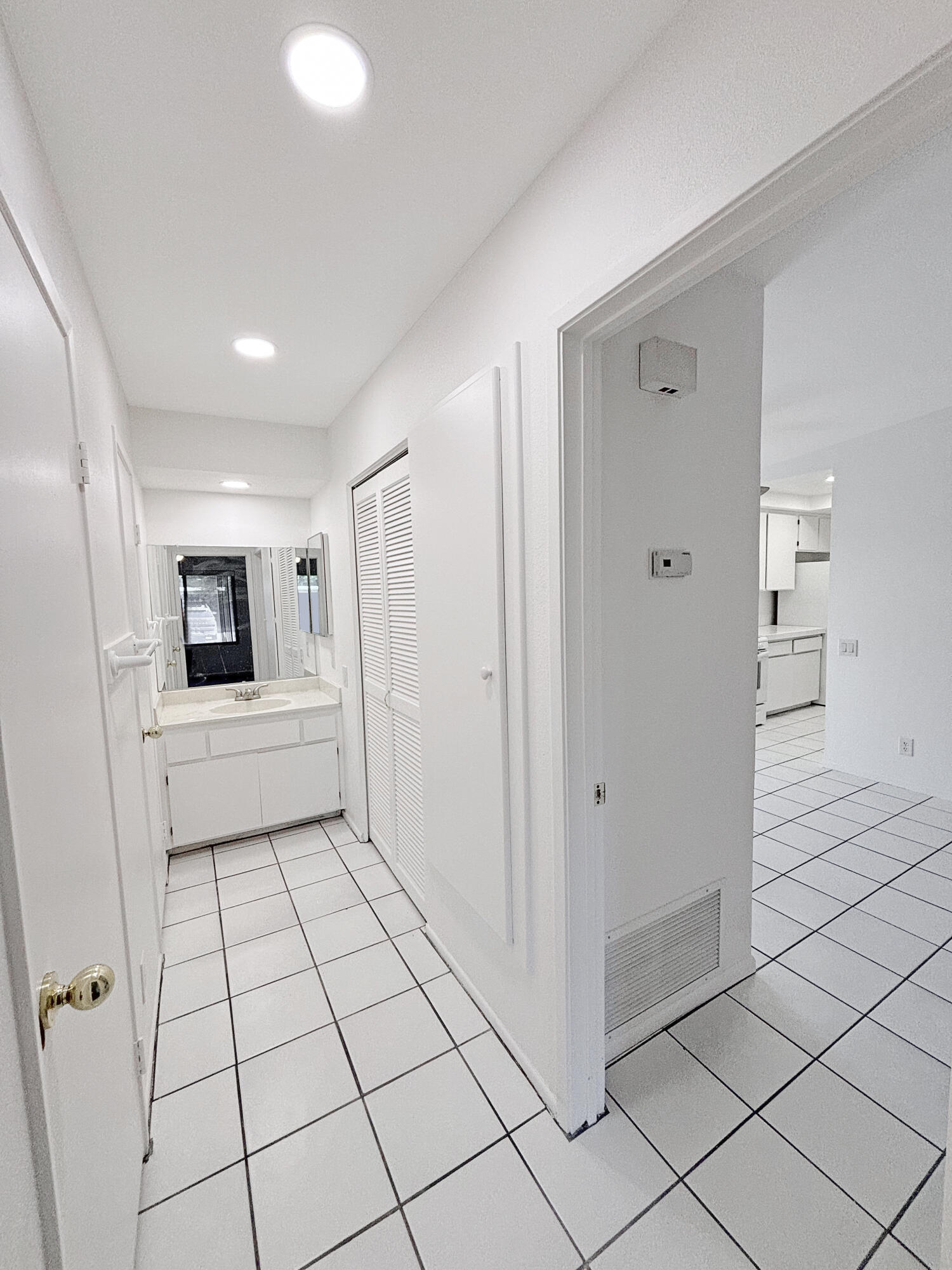 63 Lakeview Circle Cathedral City, CA 92234 - Photo 11 of 15 a view of a hallway to closet and utility room