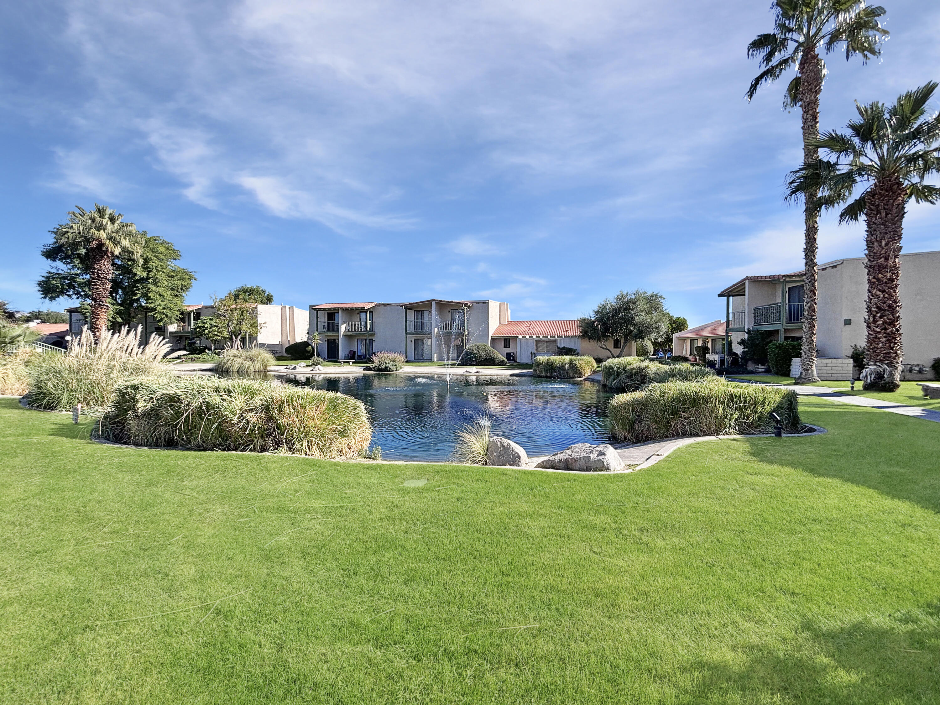 63 Lakeview Circle Cathedral City, CA 92234 - Photo 2 of 15 a view of a house with a big yard