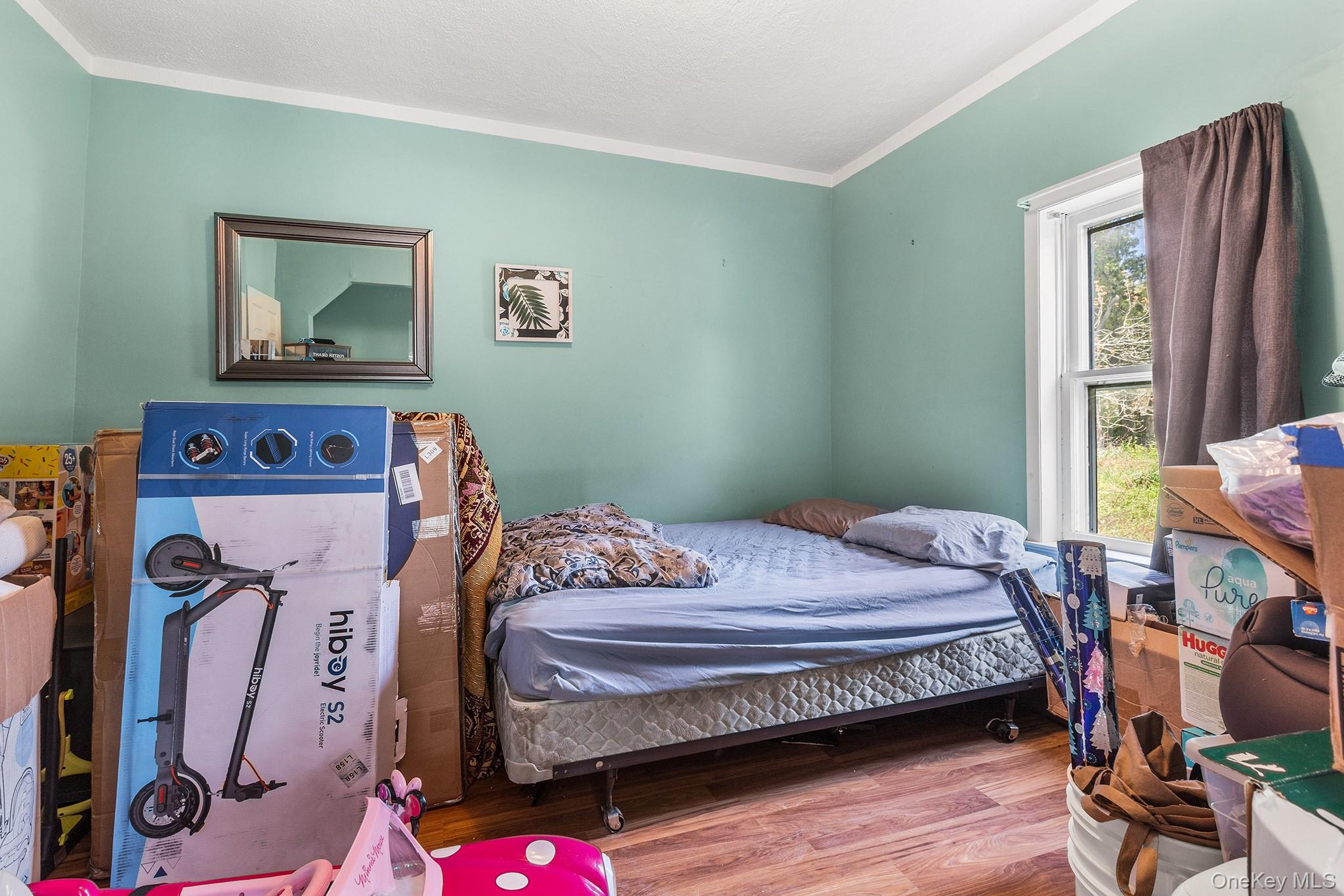 43 Taylor Road Parksville, NY 12768 - Photo 16 of 29 a bedroom with bed and a window