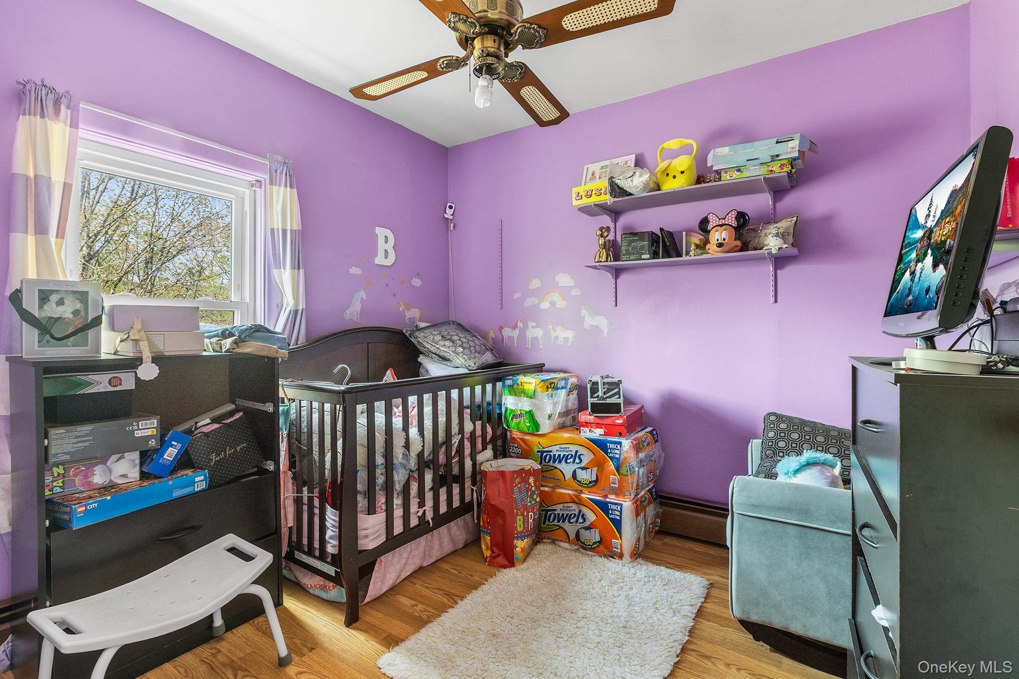 43 Taylor Road Parksville, NY 12768 - Photo 20 of 29 a bedroom with furniture a flat screen tv and a window