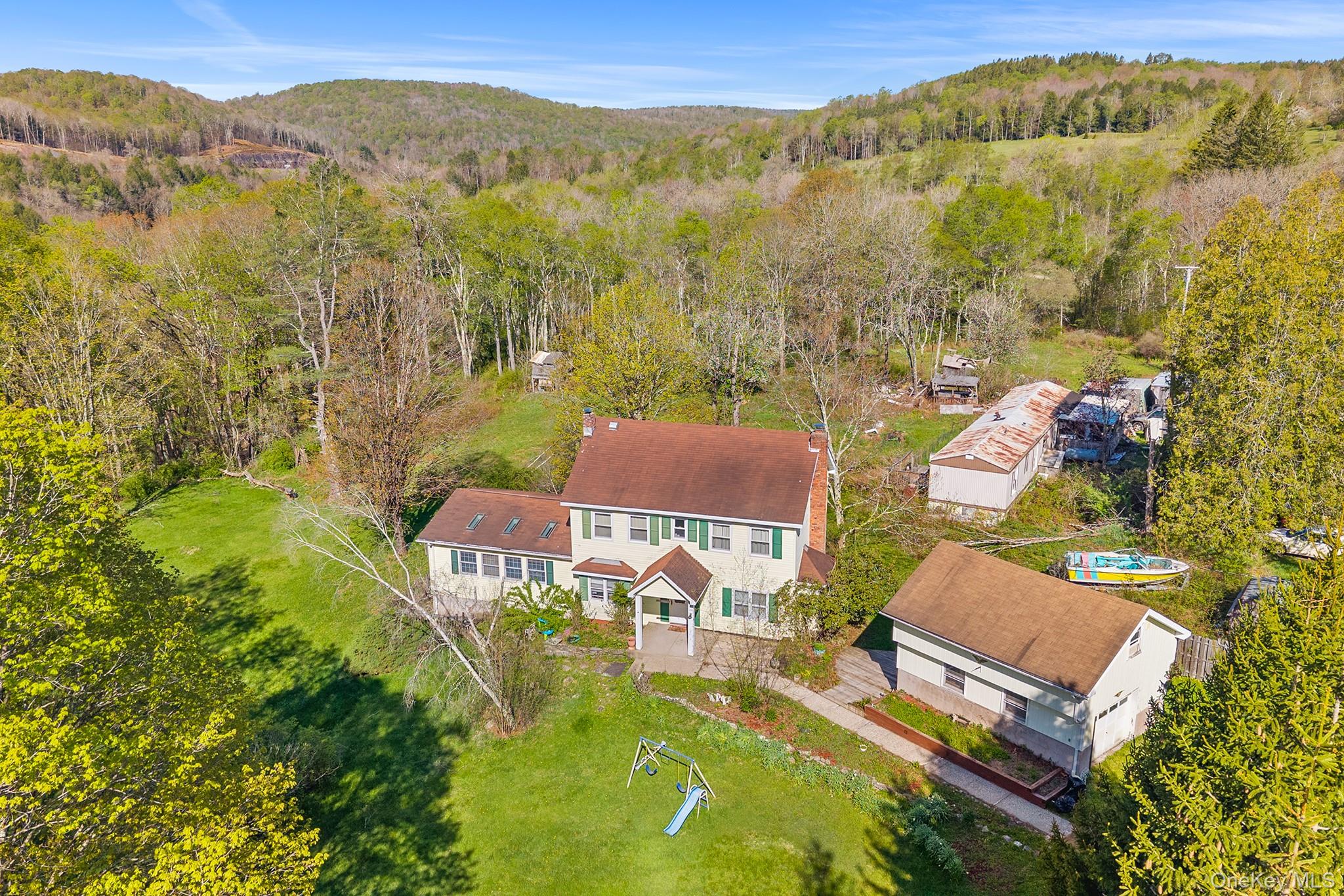 43 Taylor Road Parksville, NY 12768 - Photo 4 of 29 a view of a house with a mountain