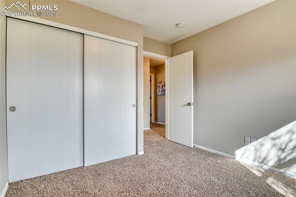 6810 Shore View Colorado Springs, CO 80922 - Photo 32 of 48 a view of bedroom