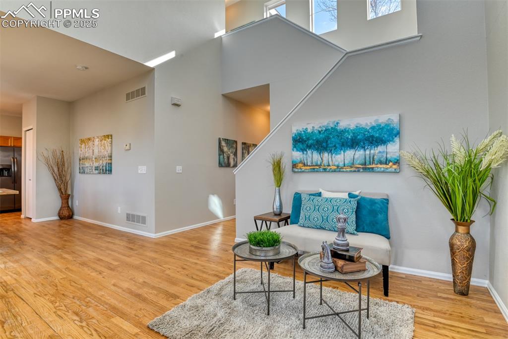 6810 Shore View Colorado Springs, CO 80922 - Photo 6 of 48 a living room with furniture and a potted plant