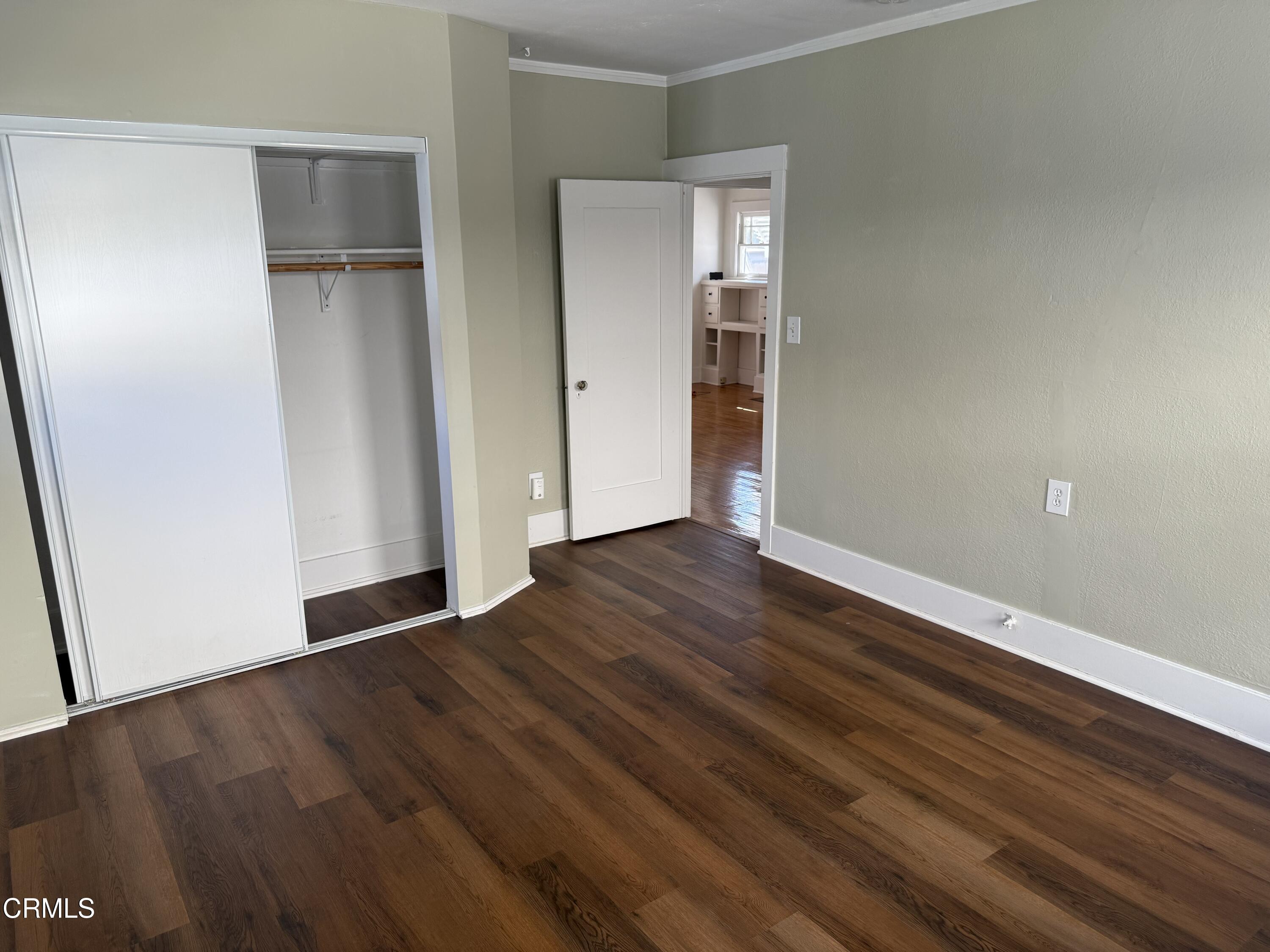 331 North Chapel Avenue Alhambra, CA 91801 - Photo 9 of 11 a view of an empty room with wooden floor and a window
