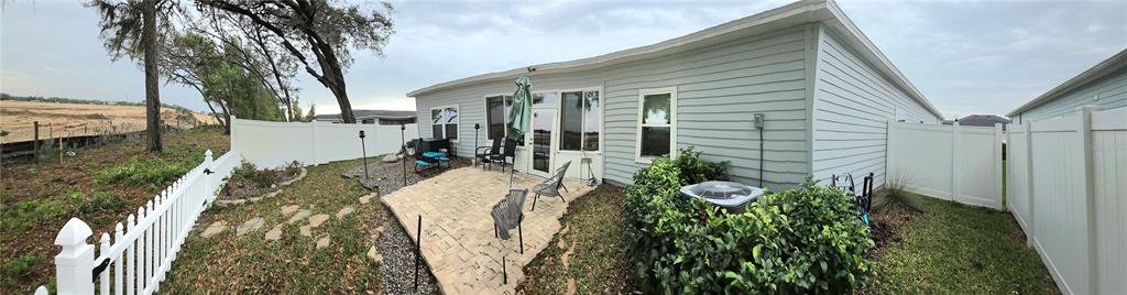 7875 Southwest 74th Street Ocala, FL 34474 - Photo 10 of 28 a view of a house with a backyard and balcony