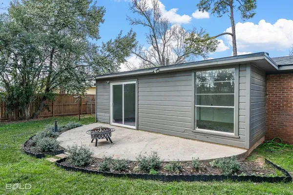a house view with a garden space