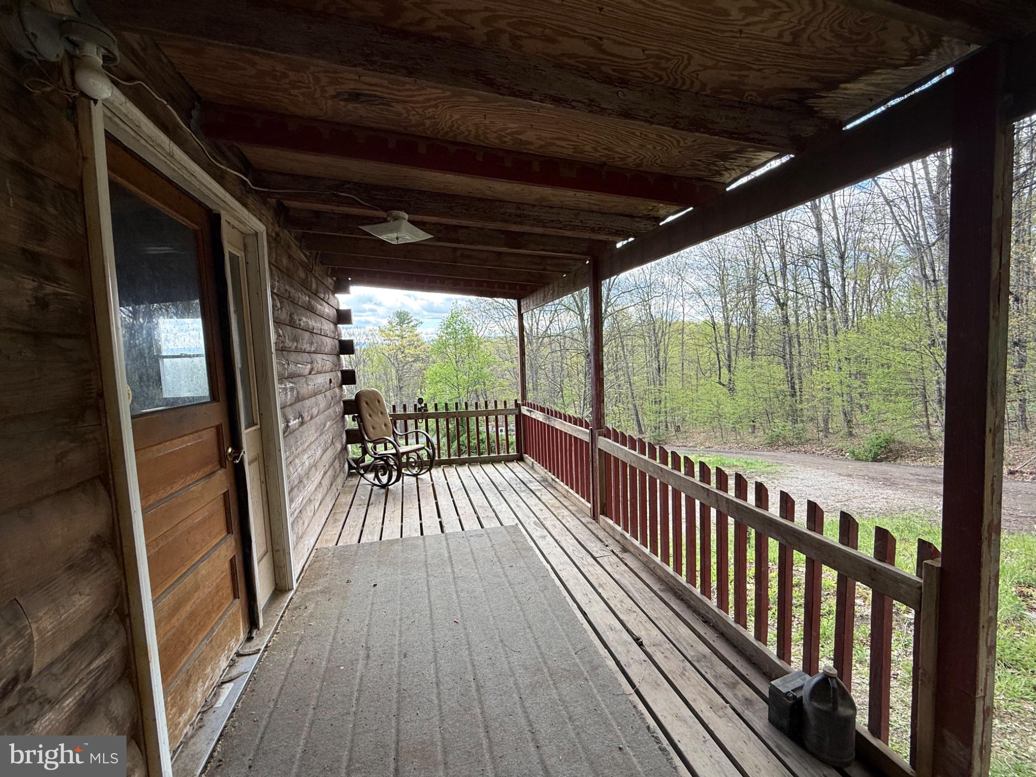 15232 Wrangletown Road Mount Union, PA 17066 - Photo 64 of 92 Serene porch with nature views.