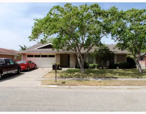 a view of street with parked cars
