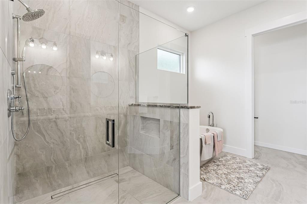 17540 3rd Street Montverde, FL 34756 - Photo 34 of 80 a bathroom with a shower