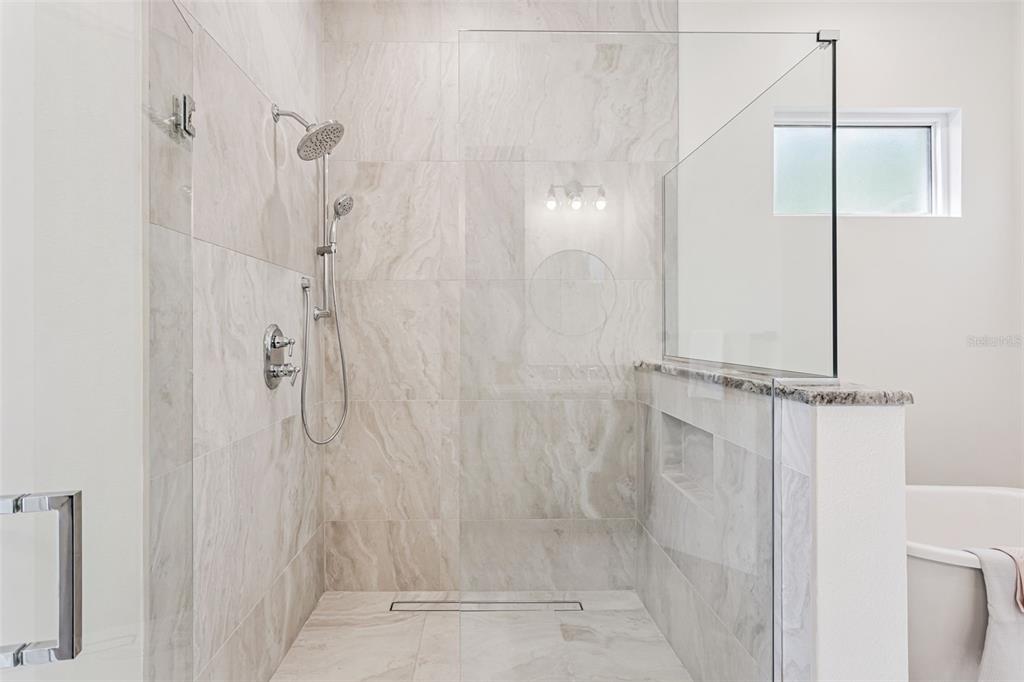 17540 3rd Street Montverde, FL 34756 - Photo 36 of 80 a bathroom with a shower