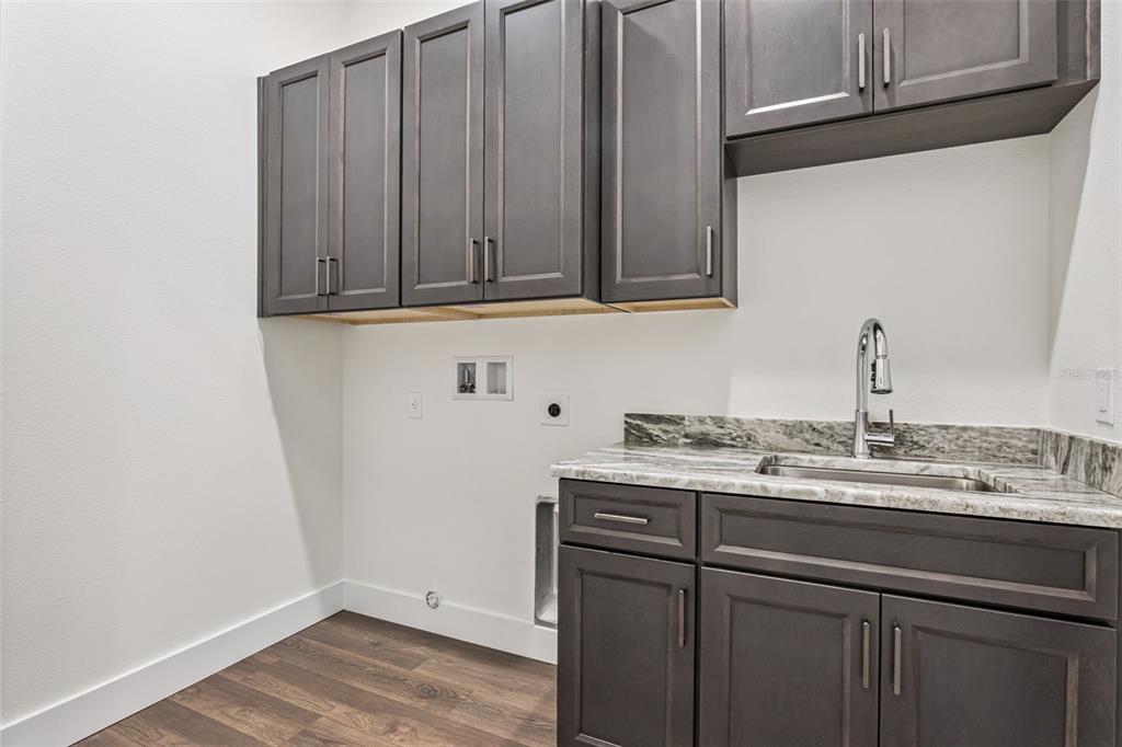 17540 3rd Street Montverde, FL 34756 - Photo 41 of 80 a view of a kitchen with cabinets