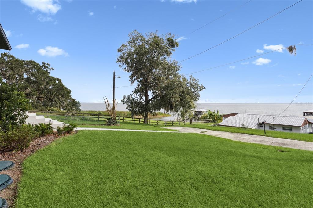 17540 3rd Street Montverde, FL 34756 - Photo 60 of 80 a view of a golf course with a garden