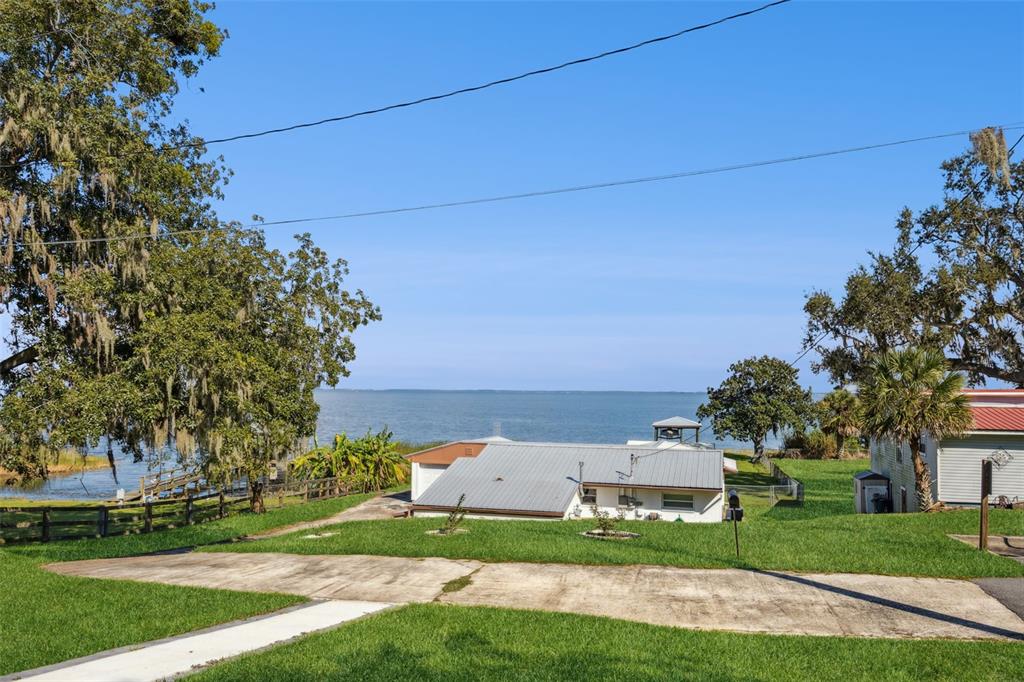 17540 3rd Street Montverde, FL 34756 - Photo 61 of 80 front view of a house with a yard