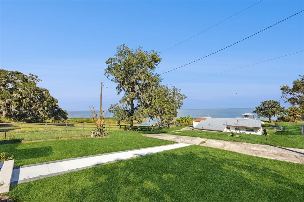 17540 3rd Street Montverde, FL 34756 - Photo 63 of 80 a view of a golf course with a lake