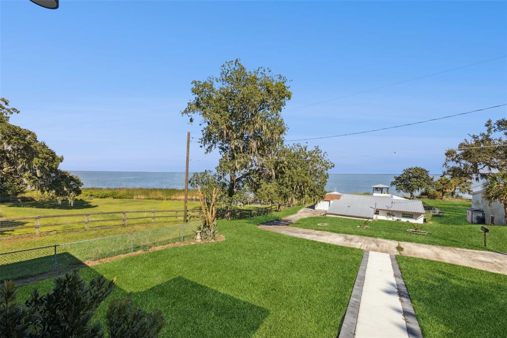 17540 3rd Street Montverde, FL 34756 - Photo 64 of 80 a view of a lake with a big yard