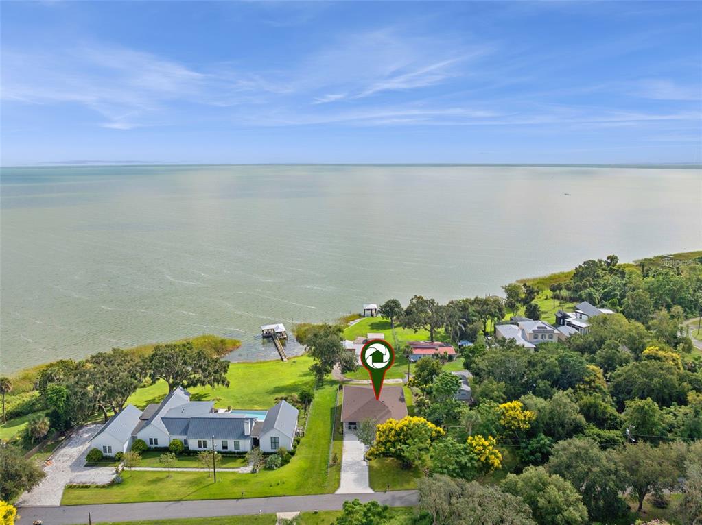 17540 3rd Street Montverde, FL 34756 - Photo 71 of 80 an aerial view of residential houses with outdoor space and swimming pool