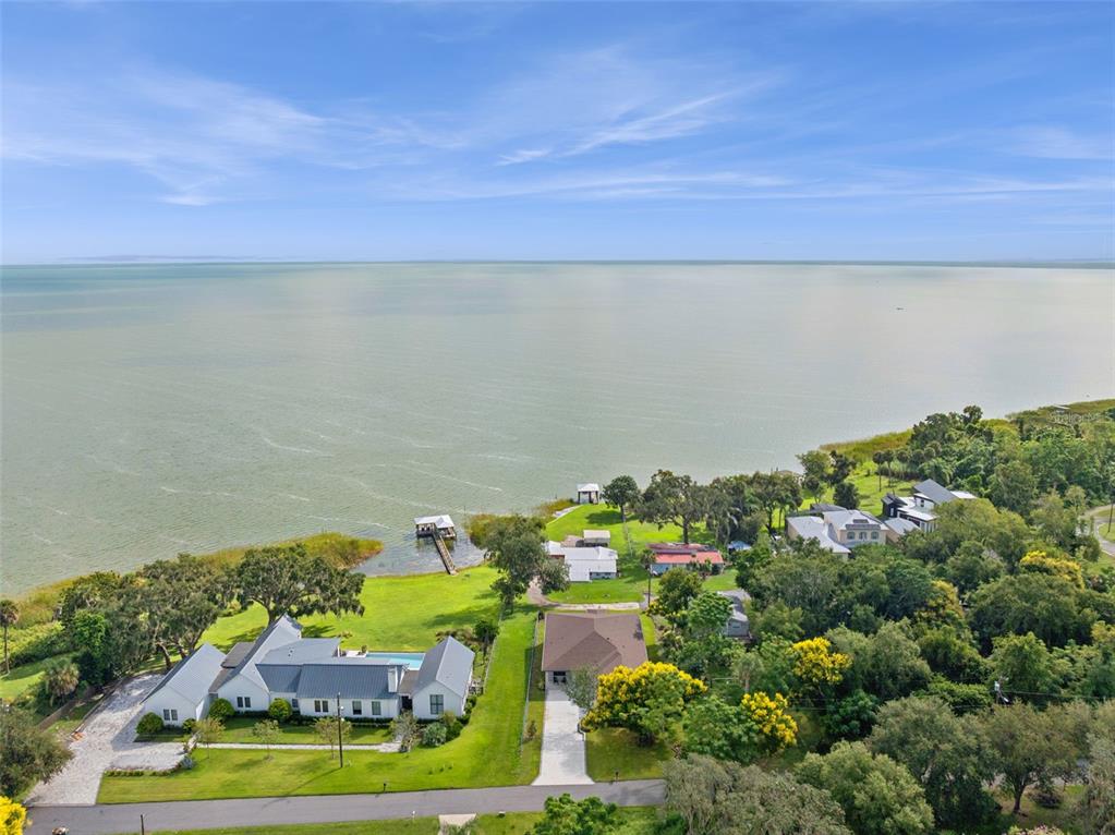 17540 3rd Street Montverde, FL 34756 - Photo 79 of 80 an aerial view of residential houses with outdoor space and swimming pool