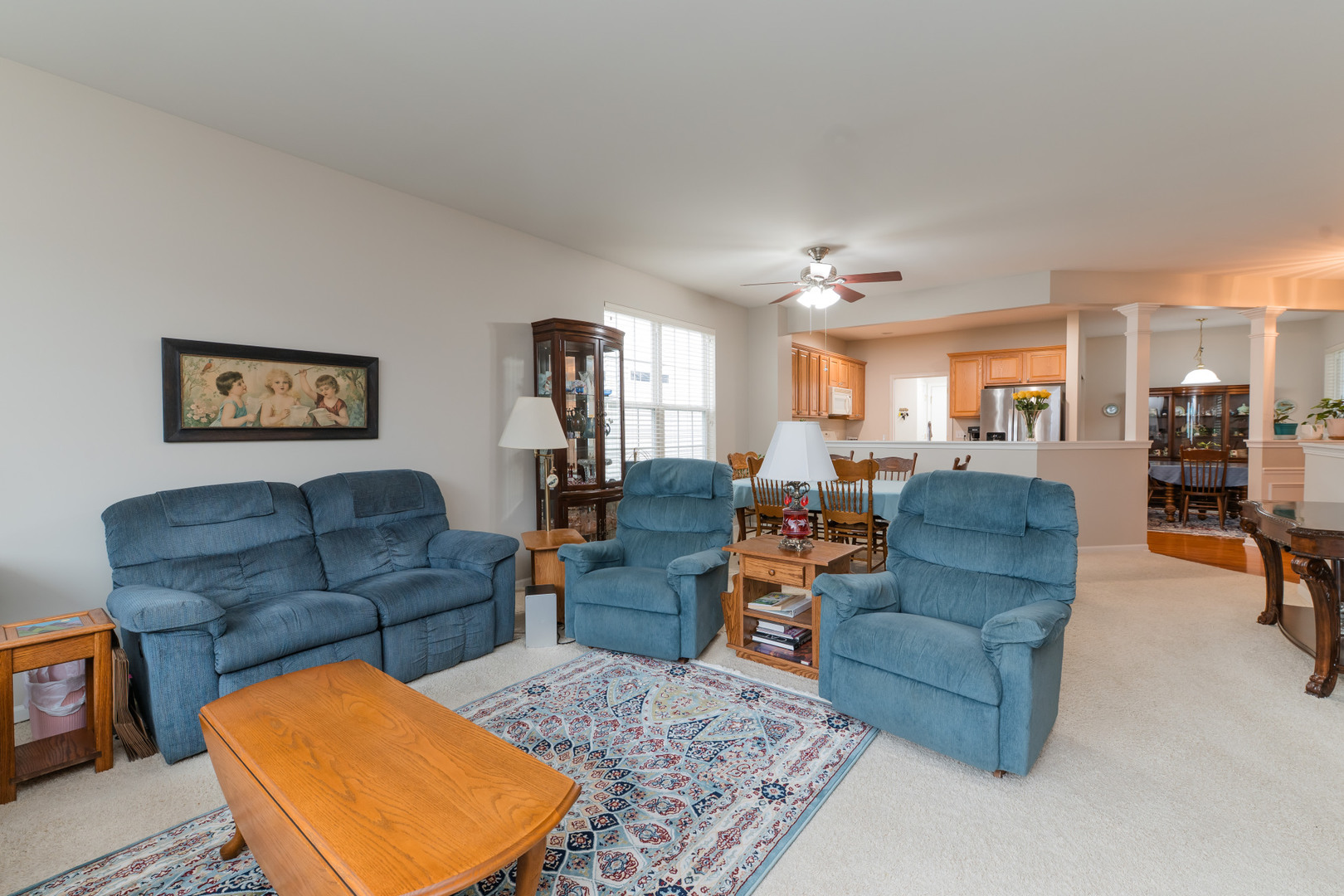 13822 Chestnut Lane Huntley, IL 60142 - Photo 12 of 43 a living room with furniture wooden floor and a table