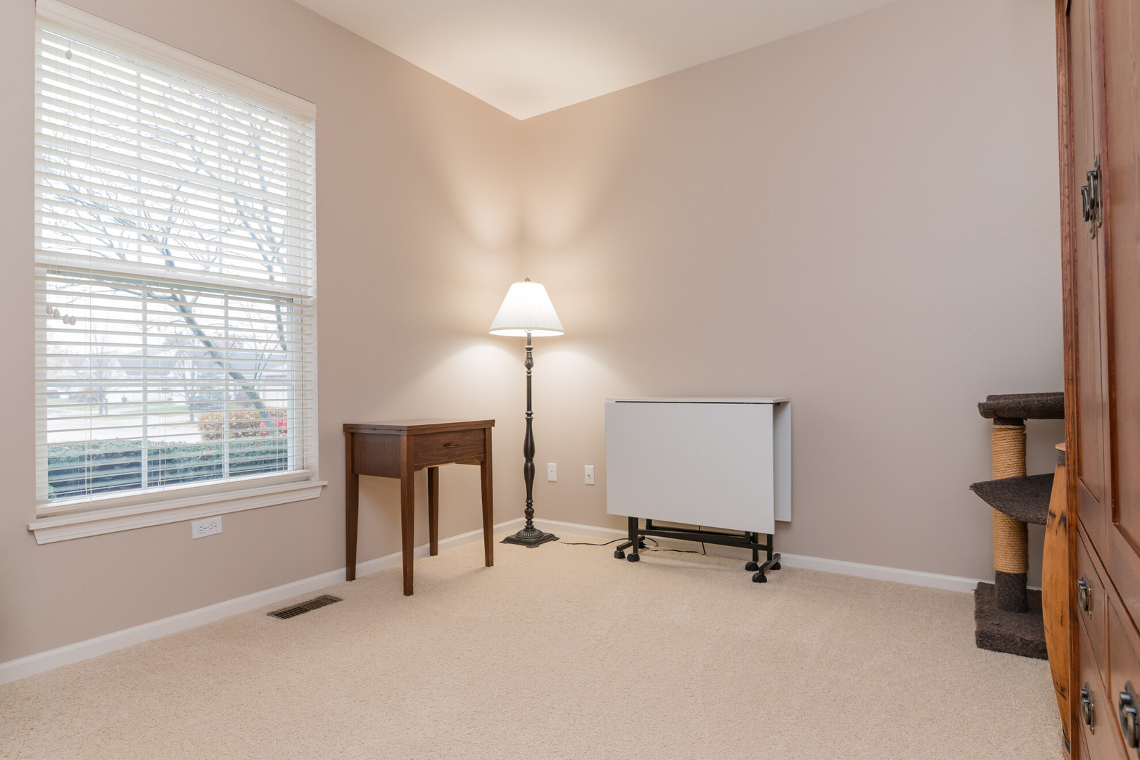 13822 Chestnut Lane Huntley, IL 60142 - Photo 14 of 43 an empty room with windows