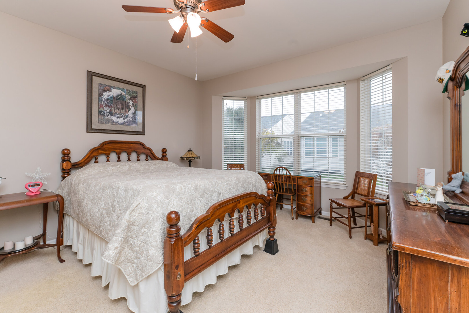 13822 Chestnut Lane Huntley, IL 60142 - Photo 17 of 43 a bed room with a bed and a chair