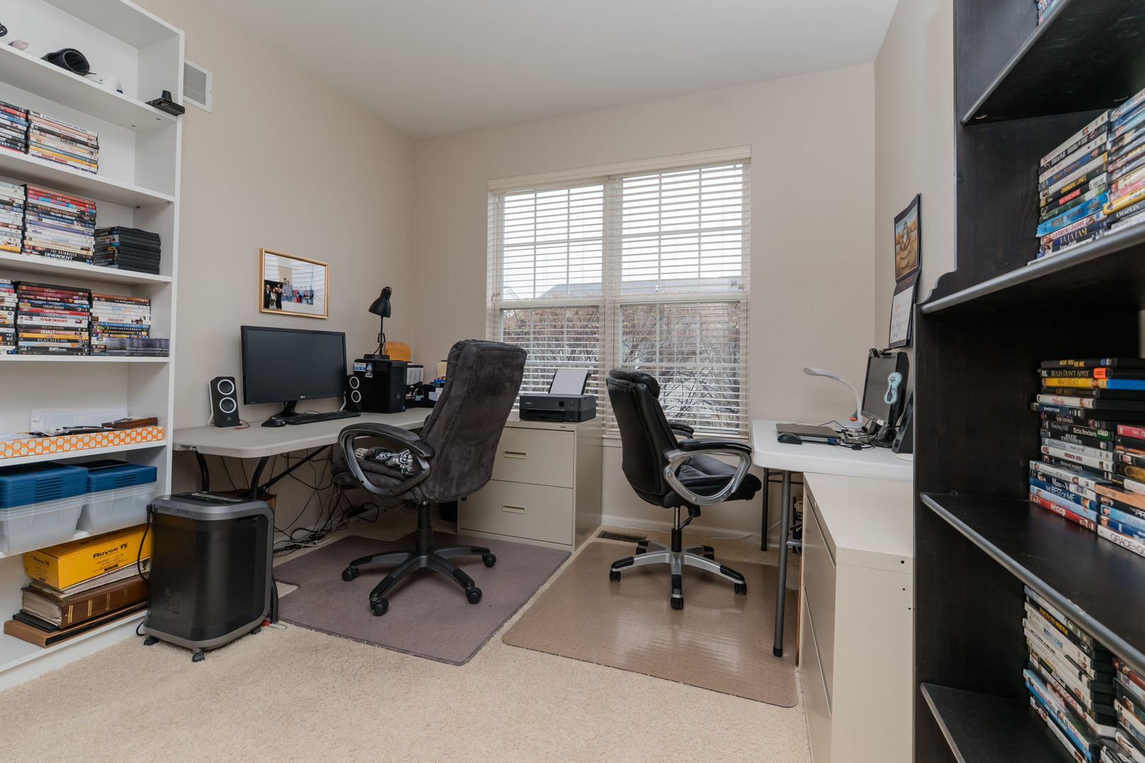 13822 Chestnut Lane Huntley, IL 60142 - Photo 24 of 43 a view of a workspace with furniture and a window