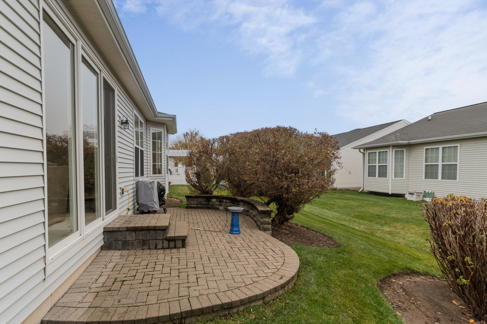 13822 Chestnut Lane Huntley, IL 60142 - Photo 29 of 43 a view of a house with backyard and sitting area