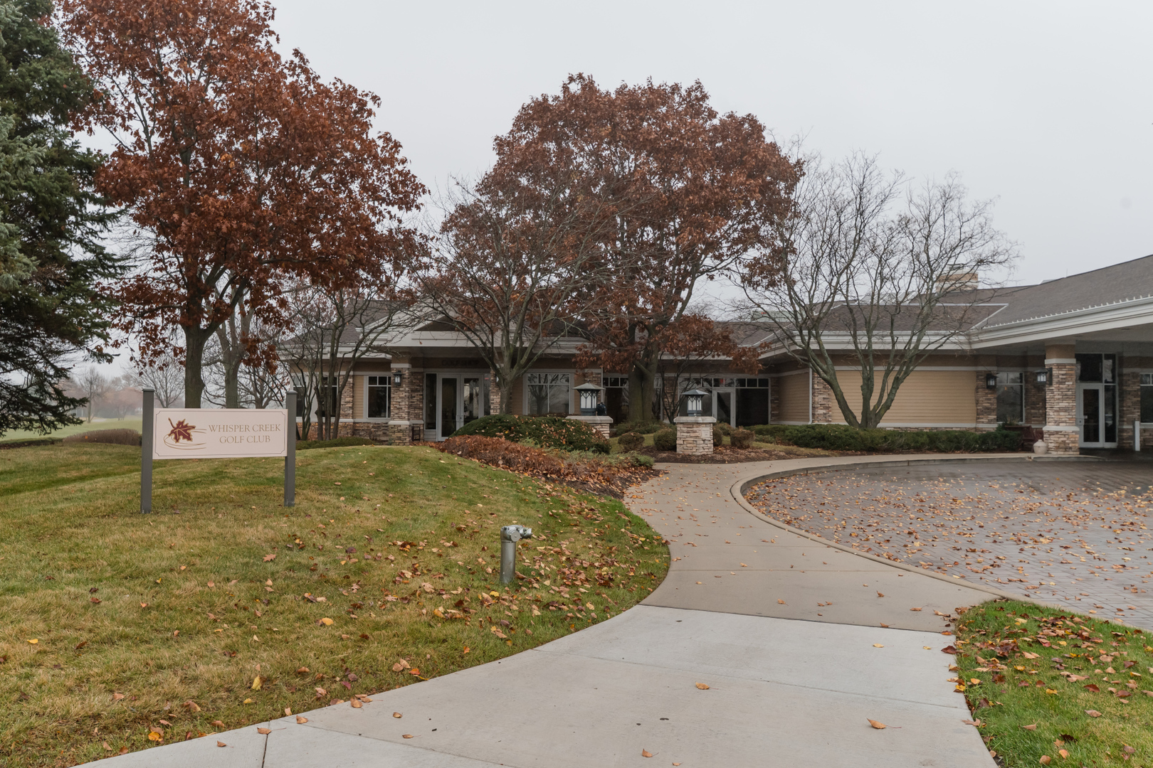 13822 Chestnut Lane Huntley, IL 60142 - Photo 38 of 43 a front view of a house with garden