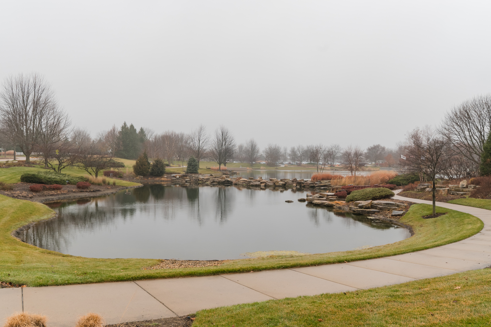 13822 Chestnut Lane Huntley, IL 60142 - Photo 41 of 43 a view of a lake with houses