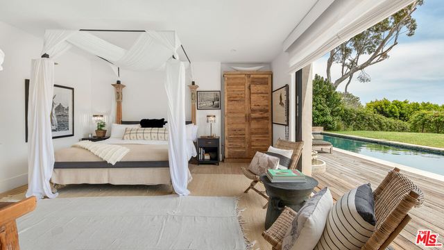 a outdoor living space with patio furniture and garden