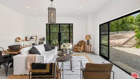 a view of a tables and chairs in patio