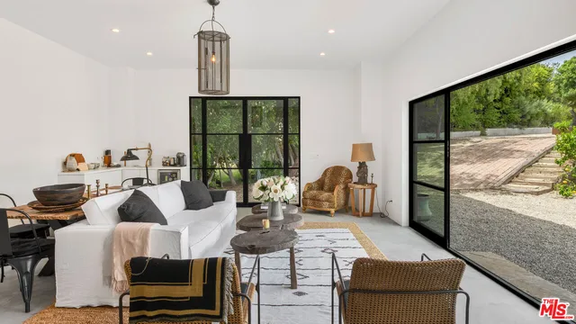 a view of a tables and chairs in patio