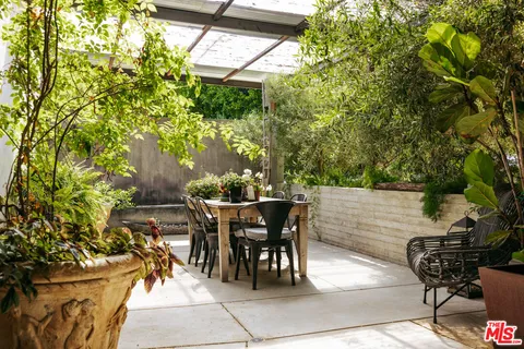 a view of a forest from a balcony