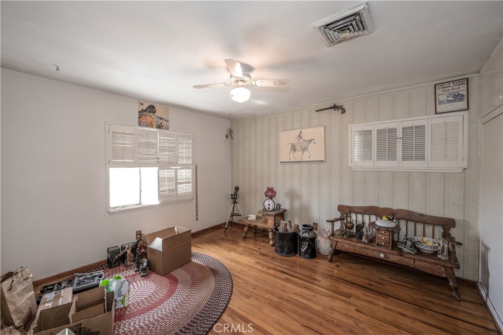 10343 Helendale Avenue Tujunga, CA 91042 - Photo 16 of 30 a living room with furniture and wooden floor