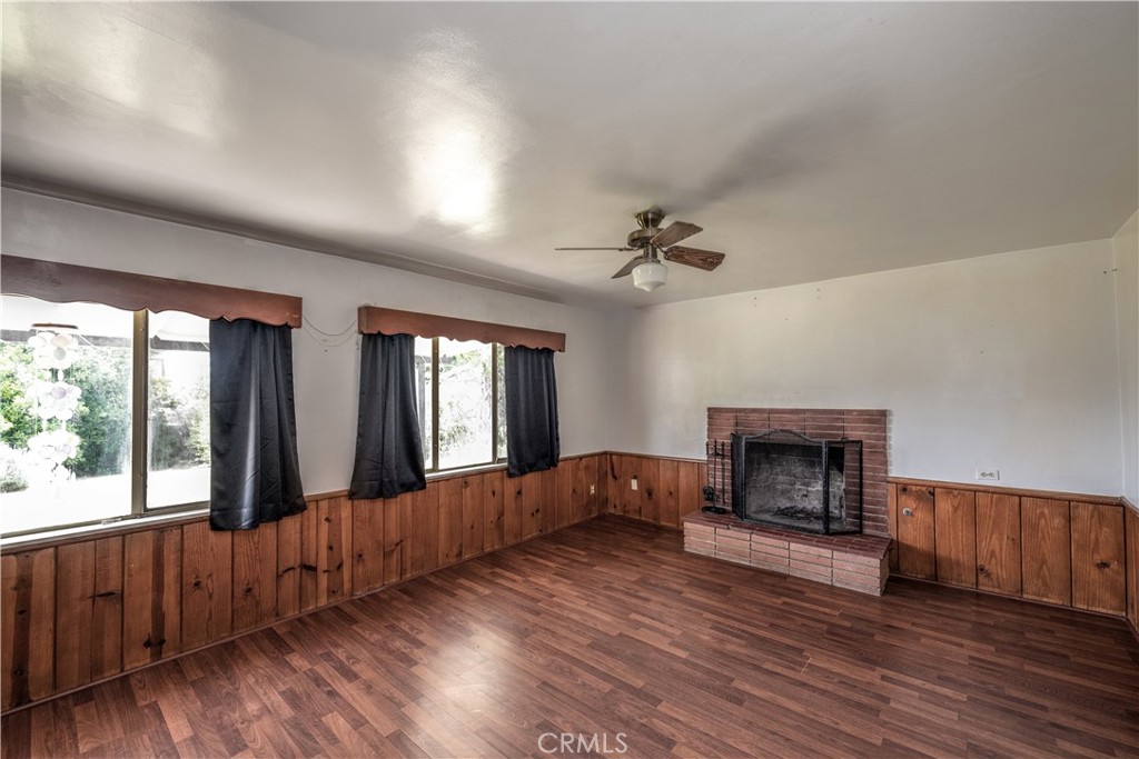 10343 Helendale Avenue Tujunga, CA 91042 - Photo 20 of 30 a living room with furniture and a fireplace