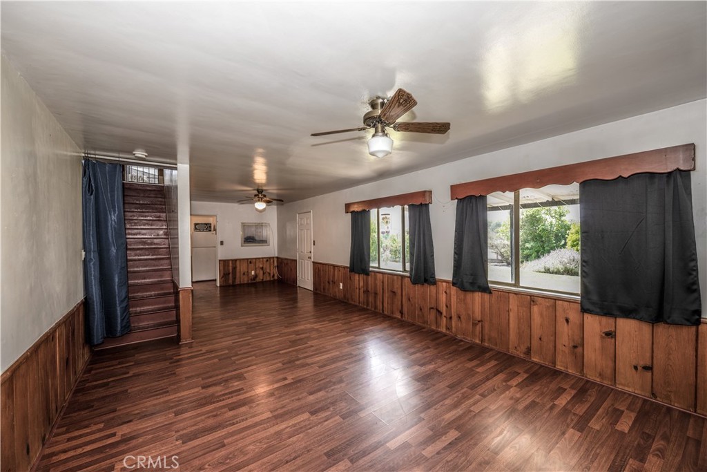10343 Helendale Avenue Tujunga, CA 91042 - Photo 21 of 30 a view of an empty room with wooden floor and a window