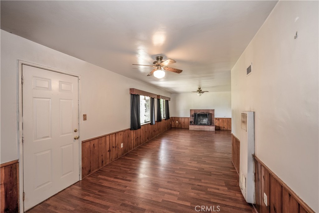 10343 Helendale Avenue Tujunga, CA 91042 - Photo 23 of 30 a view of livingroom with hardwood floor and a ceiling fan