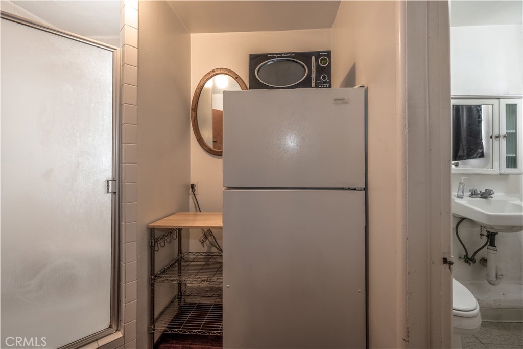 10343 Helendale Avenue Tujunga, CA 91042 - Photo 24 of 30 a close view of a refrigerator in kitchen