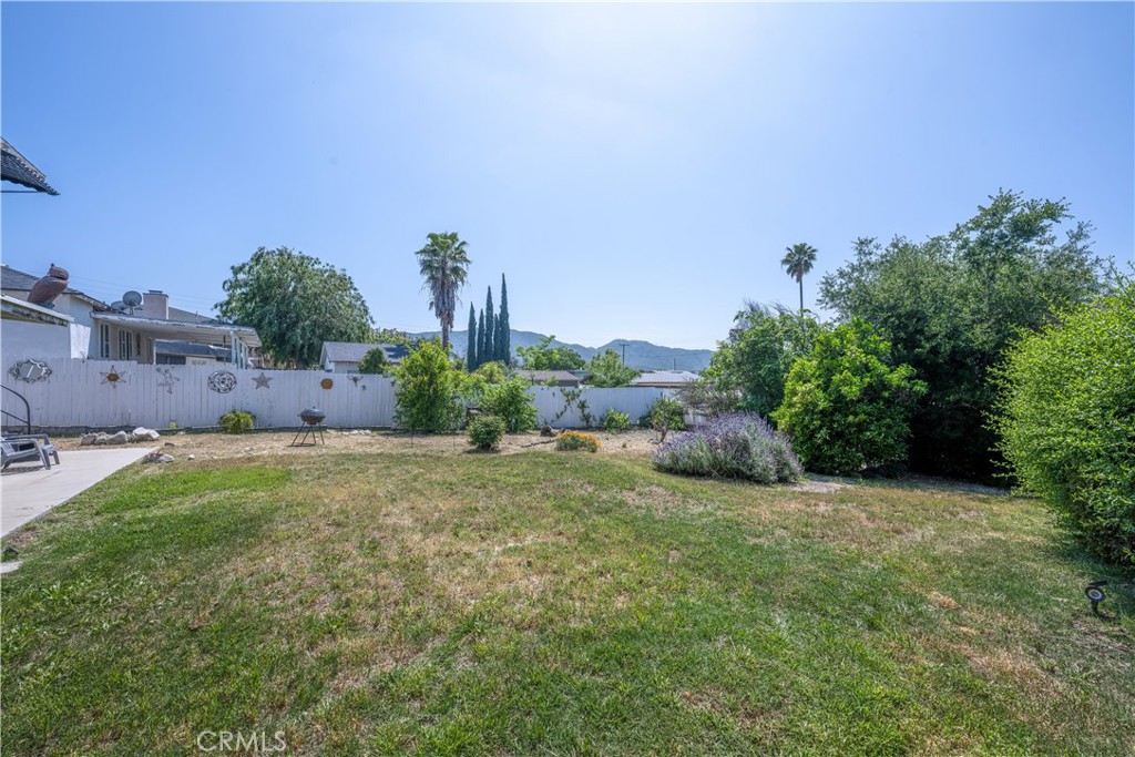 10343 Helendale Avenue Tujunga, CA 91042 - Photo 30 of 30 a view of a field with an tree and fence