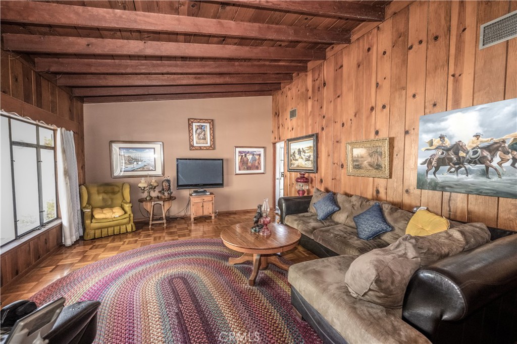 10343 Helendale Avenue Tujunga, CA 91042 - Photo 8 of 30 a living room with furniture and wooden floor