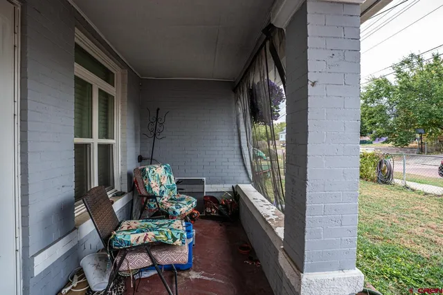 a front view of a house with a porch