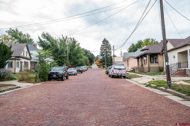 a front view of a building with a street
