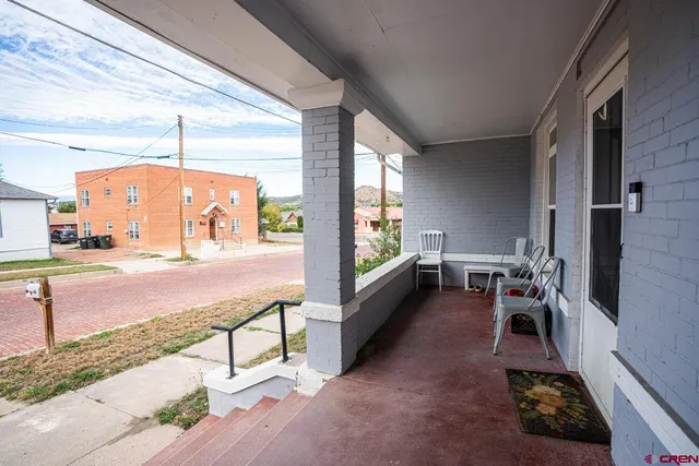 a lobby with furniture and a outdoor space