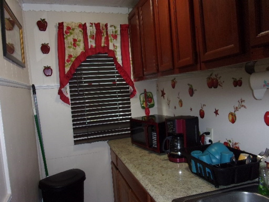 18-20 Conduit Street Lawrence, MA 01841 - Photo 4 of 23 a bathroom with a sink and a mirror