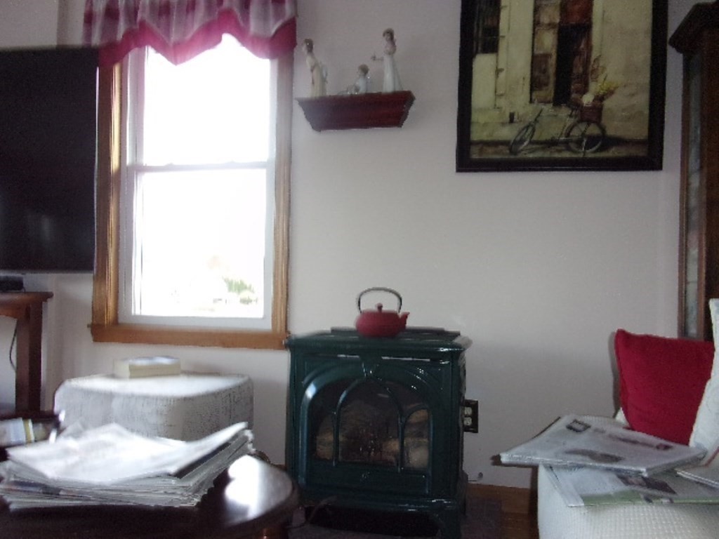 18-20 Conduit Street Lawrence, MA 01841 - Photo 10 of 23 a living room with furniture and a window