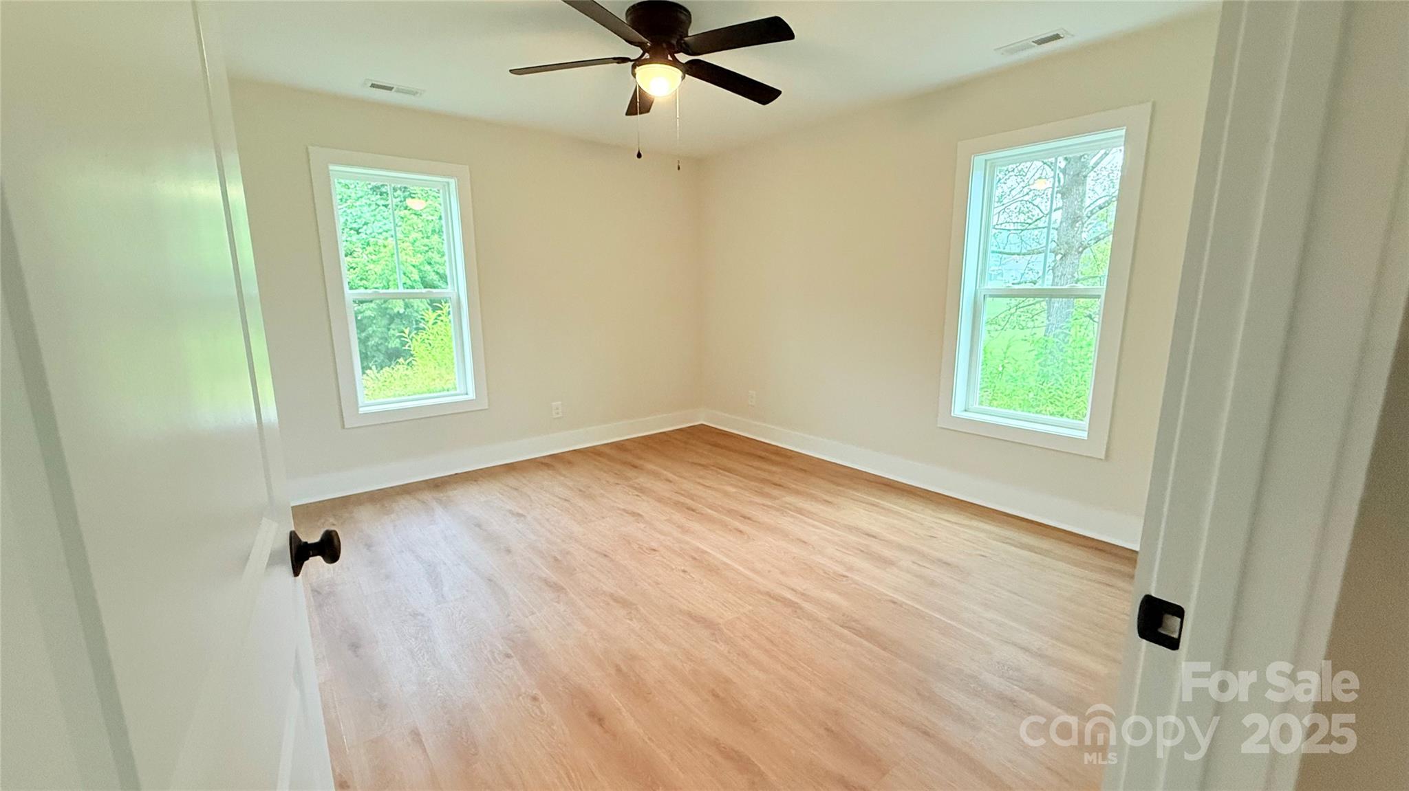 203 Beacon Avenue Morganton, NC 28655 - Photo 14 of 18 a view of an empty room with a window